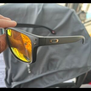 Oakley Matte Black Sunglasses with Reflective Yellow Lenses